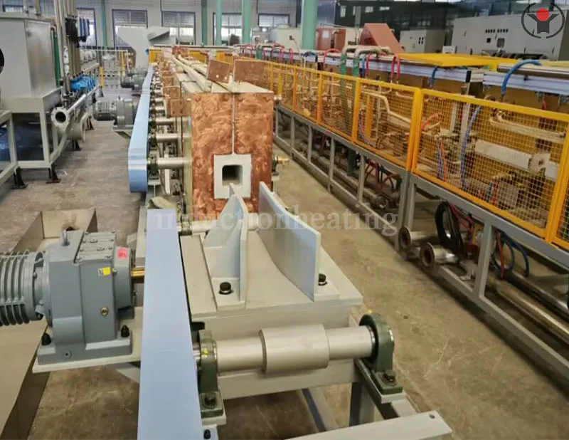 Steel billet induction reheating machine